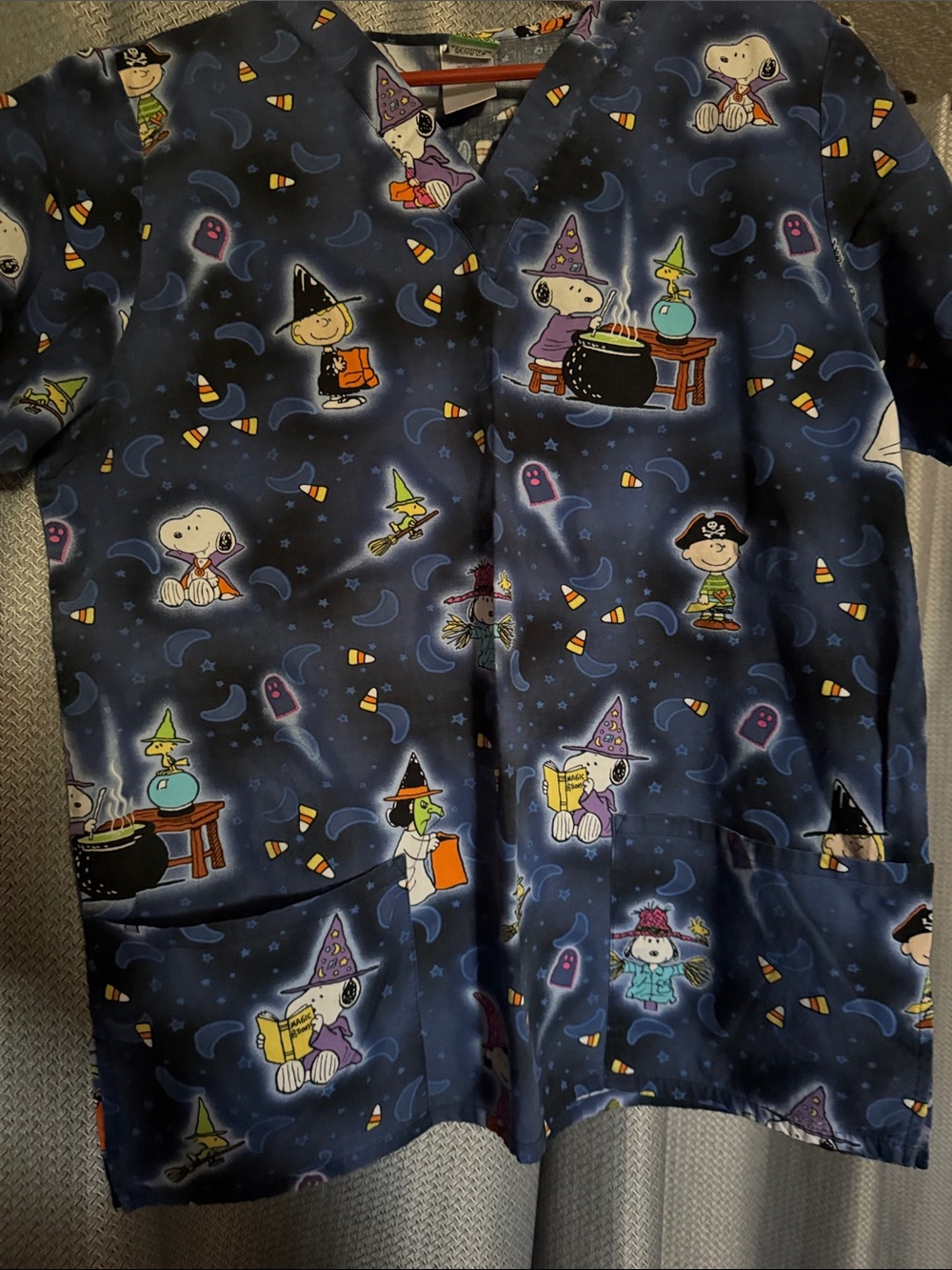 Peanuts Women's Halloween Scrub Top in Navy with Multicolor Snoopy Print